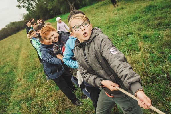 Free: group of children pulling brown rope - nohat.cc